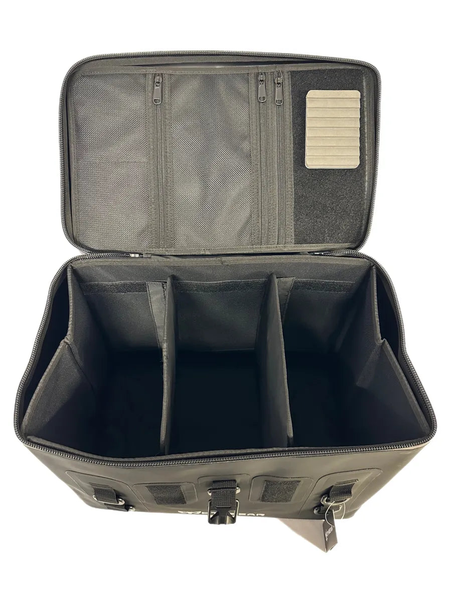 Interior view: The Black Series Boat Bag interior showing removable PVC frame and adjustable dividers for tackle.
Boat Bag interior: Close-up of Velcro loop docking area and zippered pockets inside The Black Series bag.