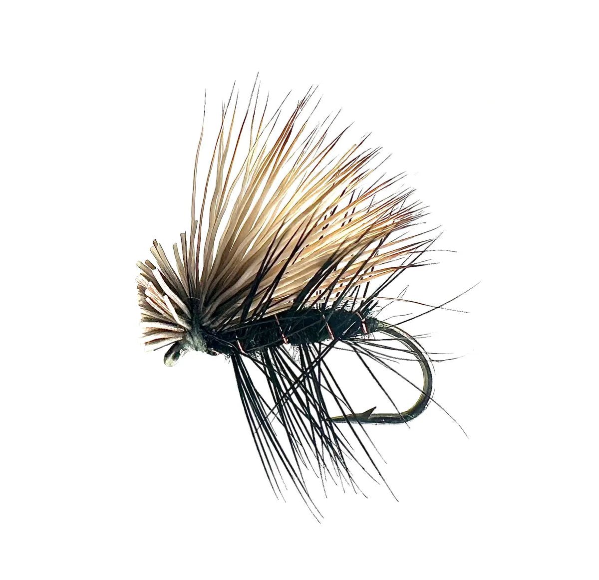 A close-up photograph showing the Elk Hair Caddis Dry Fly in sizes #12, #14, #16, and #18. The flies feature a natural brown body and a durable, high-floating bleached elk hair wing, ideal for caddis hatches and fast water.