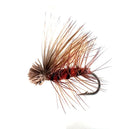 A close-up photograph showing the Elk Hair Caddis Dry Fly in sizes #12, #14, #16, and #18. The flies feature a natural brown body and a durable, high-floating bleached elk hair wing, ideal for caddis hatches and fast water.