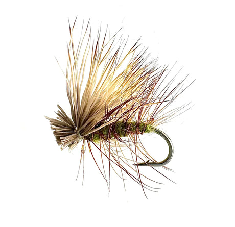 A close-up photograph showing the Elk Hair Caddis Dry Fly in sizes #12, #14, #16, and #18. The flies feature a natural brown body and a durable, high-floating bleached elk hair wing, ideal for caddis hatches and fast water.