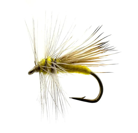 A close-up photograph showing the Yellow Sally Dry Fly in sizes #14 and #16. The flies feature a bright yellow body and upright wings, tied to imitate an adult stonefly for summer hatches.


